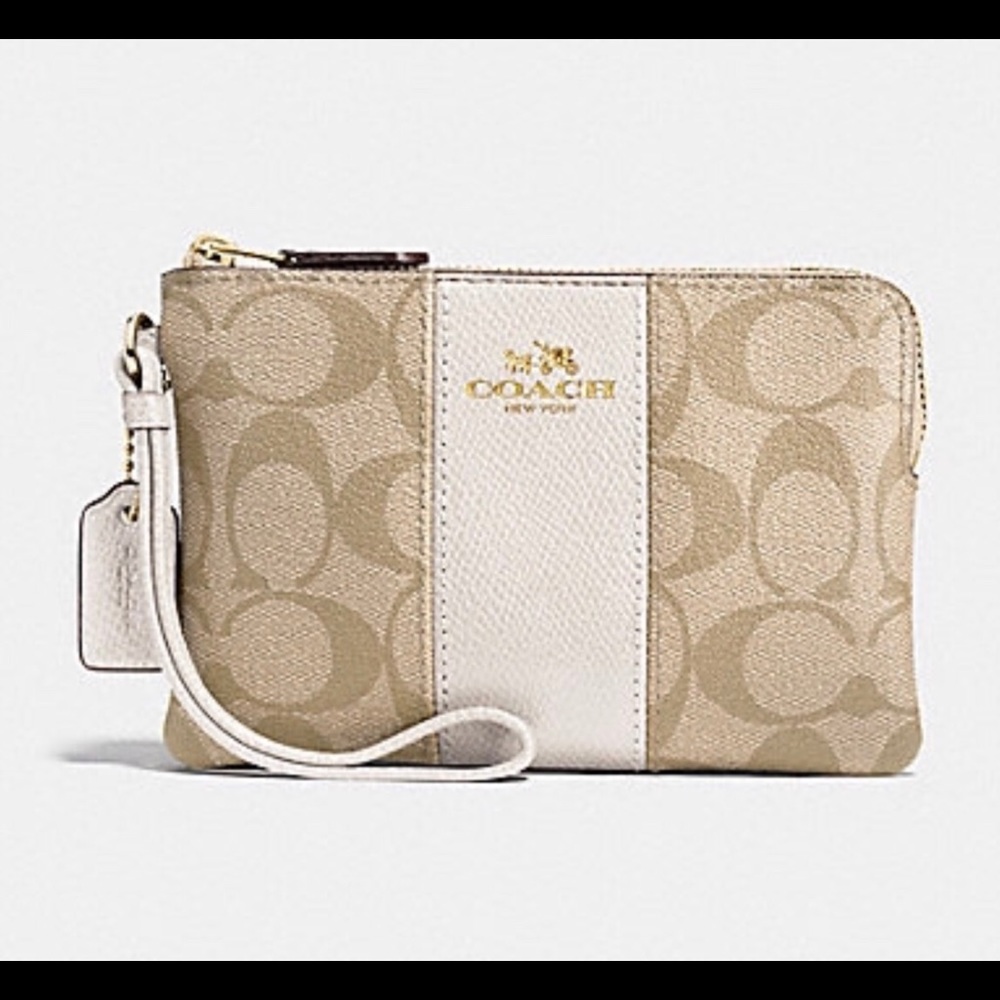 Coach signature wristlet in cream leather